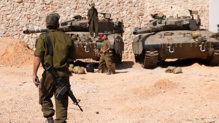 L'armée israélienne se rassemble du côté de la frontière avec le Liban, le 22 octobre 2023. (JALAA MAREY / AFP)