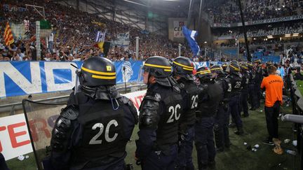 &nbsp; (Le match OM-OL de dimanche dernier. L'OM écope d'huis-clos partiel en attendant la convocation de ses dirigeants et peut-être d'autres sanctions. © Maxppp)