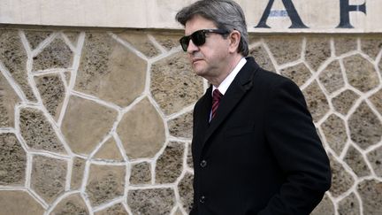 Jean-Luc M&eacute;lenchon sort d'un bureau de vote, dimanche 23 mars 2014 &agrave; Paris. (BERTRAND GUAY / AFP)