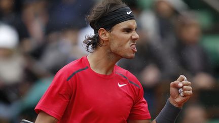 La grimace de la victoire de Rafael Nadal, vainqueur de Roland-Garros contre Novak Djokovic en finale, le 11 juin 2012. (GONZALO FUENTES / REUTERS)