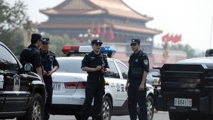 A Pékin, l'accès à la place Tiananmen était strictement controlé par la police, le 4 Juin 2014. (GOH CHAI HIN / AFP)