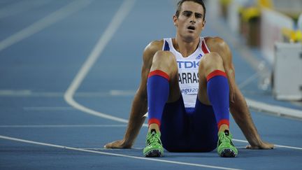 Le d&eacute;cathlonien, Romain Barras, lors de la finale du 400 m&egrave;tres-d&eacute;cathlon&nbsp;des championnats du monde d'athl&eacute;tisme &agrave; Daegu&nbsp;(Cor&eacute;e du Sud) le 27 ao&ucirc;t 2011. (OLIVIER MORIN / AFP)