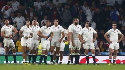 &nbsp; (Les Anglais après leur défaite face à l'Australie, dans le stade de Twickenham à Londres © REUTERS - Reuters Staff)