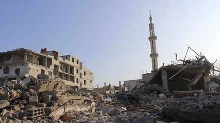 Des b&acirc;timents d&eacute;truits par les bombes &agrave; Damas (Syrie), le 26 d&eacute;cembre 2012. (REUTERS)