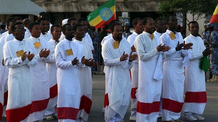 Ils frappent dans leurs mains et chantent de longues mélopées.
 
 (Minasse Wondimu Hailu / ANADOLU AGENCY / AFP)