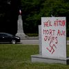 Des tags antisémites ont été découverts le 15 juillet 2023 sur une stèle commémorant la mort de 55 personnes exécutées par les nazis en 1944, à Plœuc-L'Hermitage (Côtes-d'Armor). (DAMIEN MEYER / AFP)