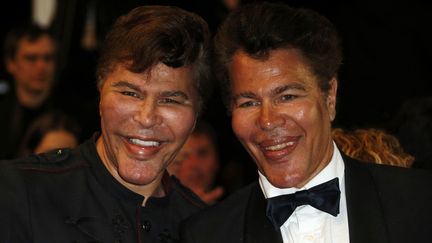 Les frères Grichka (à gauche) et Igor&nbsp;Bogdanoff, lors de la 66e édition du festival de Cannes, le 24 mai 2013. (VALERY HACHE / AFP)