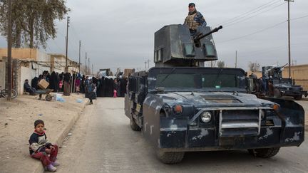 La rue principale Hammam Al Alil, à Mossoul, en Irak, le 30 novembre 2016. La ville a été libérée&nbsp;de l'Etat Islamique le 7 novembre 2016.&nbsp; (OLYA MORVAN / HANS LUCAS)