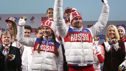 Les tenues officielles russes reprennent le sigle du pays, RU, sur la plupart des v&ecirc;tements, comme ici le bonnet. (SERGEI KARPUKHIN / REUTERS)