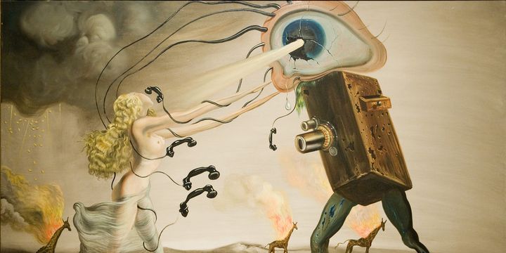 Rhapsodic moderne (les Sept Arts) est une peinture de Dali qui date de 1957. Le peintre avait alors 53 ans, et a priori pas de maladie de Parkinson. 
