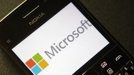 &nbsp; (Microsoft annonce 18.000 suppressions d'emploi, pour digérer le rachat de Nokia © REUTERS/Heinz-Peter Bader)