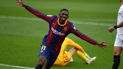 Ousmane Dembélé savoure son troisième but de la saison en Liga. (CRISTINA QUICLER / AFP)