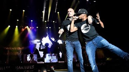 Philippe Fragione aka Akhenaton and Geoffroy Mussard aka Shurik'n, le 20 juillet 2018, à&nbsp;Carhaix-Plouguer, aux Vieilles Charrues. (FRED TANNEAU / AFP)