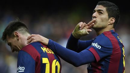 Le duo d'attaquants du FC Barcelone Lionel Messi et Luis Suarez