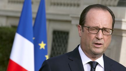 Fran&ccedil;ois Hollande, le 26 juillet 2014 &agrave; Paris. (PHILIPPE WOJAZER / AFP)