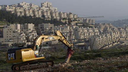 Un site de construction de logements dans les colonies isra&eacute;liennes &agrave; J&eacute;rusalem-Est, le 19 mars 2014. (AHMAD GHARABLI / AFP)