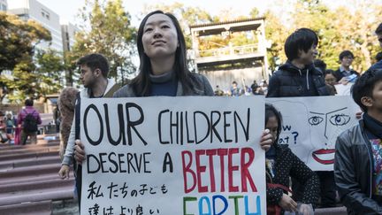 Cette&nbsp;manifestante demandait une&nbsp;"meilleure Terre" à&nbsp;léguer aux générations futures. (ALESSANDRO DI CIOMMO / NURPHOTO)