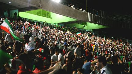 Football fans gather for an event at the Azadi stadium in Tehran, Iran, on June 20, 2018. (FATEMEH BAHRAMI / ANADOLU AGENCY / AFP)