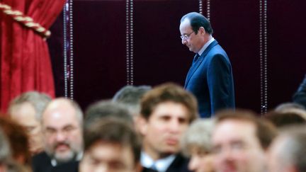 Le pr&eacute;sident, Fran&ccedil;ois Hollande, s'appr&ecirc;te &agrave; adresser ses v&oelig;ux aux acteurs &eacute;conomiques, le 21 janvier 2014 &agrave; l'Elys&eacute;e.&nbsp; (PHILIPPE WOJAZER / AFP)