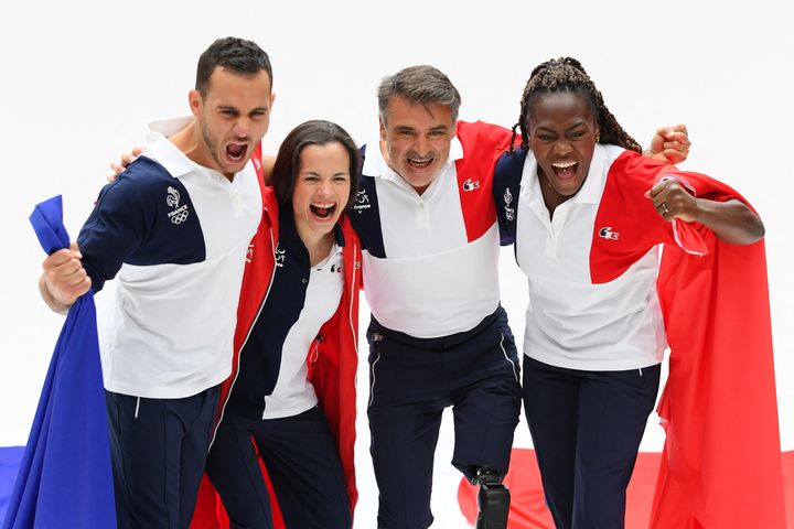 Samir Aït Said, Sandrine Martinet, Stéphane Houdet et&nbsp;Clarisse Agbegnenou (de g. à d.) sont les quatre portes-drapeaux français.&nbsp; (MILLEREAU PHILIPPE / KMSP / AFP)