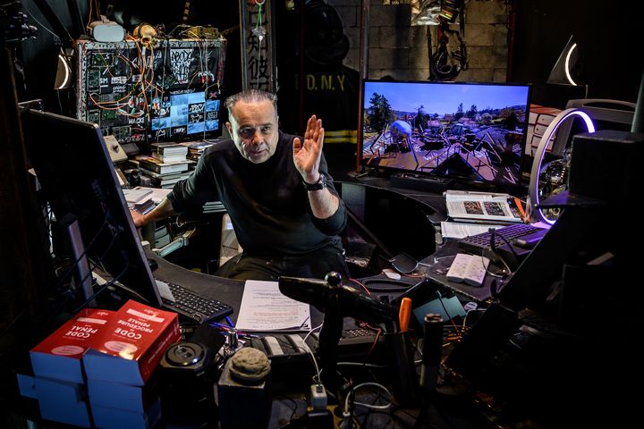 L'artiste et businessman Thierry Ehrmann, fondateur de la Demeure du Chaos et de Artprice, dans son bureau le 25 novembre 2019. (JEAN-PHILIPPE KSIAZEK / AFP)