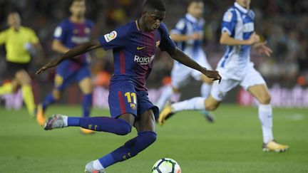 Ousmane Dembélé auteur d'une passe décisive contre l'Espanyol Barcelone. (LLUIS GENE / AFP)