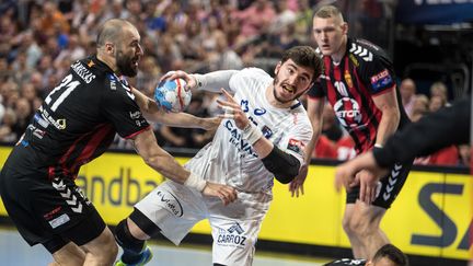 Le joueur de Montpellier Ludovic Fabregas (au centre) lors de la demi-finale de la Ligue des Champions de handball contre le Vardar Skopje, le 26 mai 2018 à Cologne (MAXPPP)