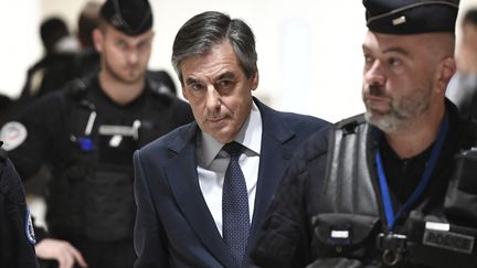 L'ancien Premier ministre français François Fillon arrive au palais de justice de Paris,&nbsp;27 février 2020.&nbsp; (STEPHANE DE SAKUTIN / AFP)