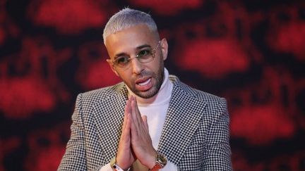 Marseille rapper Naps poses on the red carpet before the NRJ Music Awards ceremony, at the Palais des Festivals in Cannes (Alpes-Maritimes), on November 20, 2021. (VALERY HACHE / AFP)