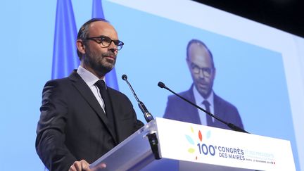 Edouard Philippe s'adresse aux maires à l'occasion de leur 100e congrès. (JACQUES DEMARTHON / AFP)