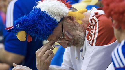 GROUPE D - FRANCE - Footix a fait des d&eacute;g&acirc;ts. Le coq fran&ccedil;ais s'affiche d&eacute;sormais sur le cr&acirc;ne de bons nombres de supporters fran&ccedil;ais. (CROPIX / SIPA)