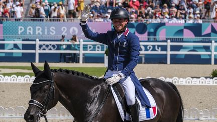 Le cavalier Corentin Pottier lors de l'épreuve de dressage individuel en équitation des Jeux de Paris, le 30 juillet 2024, à Versailles. (BRICOT CHRISTOPHE / KMSP / AFP)