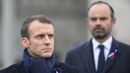 Le président de la République, Emmanuel Macron, et le Premier ministre Edouard Philippe, lors des cérémonies de commémoration du 11-Novembre, le 11 novembre 2018 à Paris.&nbsp; (LUDOVIC MARIN / POOL / AFP)