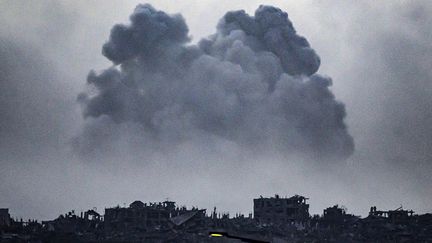 A photo taken from southern Israel, near the border with the Gaza Strip, shows smoke billowing after an Israeli strike on the north of the enclave, November 23, 2023. (JOHN MACDOUGALL / AFP)