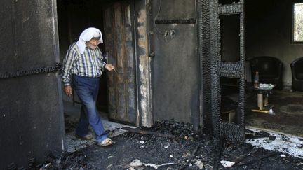 &nbsp; (La maison incendiée de Kafr Douma où le bébé a trouvé la mort © REUTERS | Abed Omar Qusini)