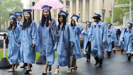 Des dipl&ocirc;m&eacute;es de l'universit&eacute; de Columbia se rendent &agrave; leur c&eacute;r&eacute;monie de "graduation", &agrave; New York, le 16 mai 2011. (RIEGER BERTRAND / HEMIS.FR)