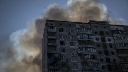 Un immeuble résidentiel touché par une frappe russe à Kiev (Ukraine), le 15 mars 2022.&nbsp;
 (AFP)