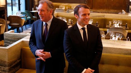 François Bayrou et Emmanuel Macron, au Palais de Tokyo, à Paris, le 23 février 2017. (CHARLES PLATIAU / REUTERS)