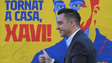 Xavi lors de sa présentation au Camp Nou, le lundi 8 novembre 2021. (LLUIS GENE / AFP)