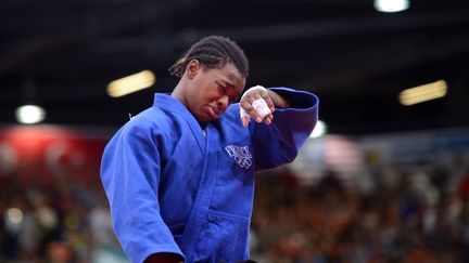 Audrey Tcheumeo voulait l'or ou rien. La championne du monde a d&ucirc; se contenter du bronze remport&eacute; en petite finale, le 2 ao&ucirc;t 2012 aux JO de Londres.&nbsp; (JOHANNES EISELE / AFP)