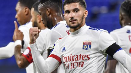 Houssem Aouar serre le poing après son but sur pénalty contre Monaco. (PHILIPPE DESMAZES / AFP)