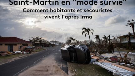 Une épave de voiture dans une rue de Baie Nettlé, le 10 septembre 2017, après le passage de l'ouragan Irma sur l'île de Saint-Martin. (MARTIN BUREAU / AFP)