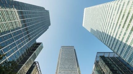 Immeubles de Canary Wharf à Londres, symboles de l'embellie de l'économie britannique (2014). (MISCHA KEIJSER / CULTURA CREATIVE)