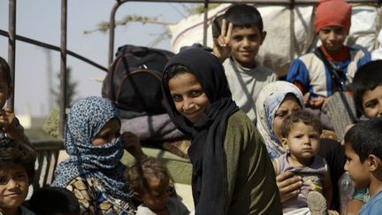 Enfants de retour à Manbij. (AFP/Delil Souleiman)