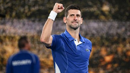 Novak Djokovic après sa victoire au troisième tour de l'Open d'Australie, le 19 janvier 2024. (WILLIAM WEST / AFP)