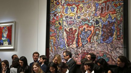 Les ench&egrave;res ont vu aussi un record mondial pour le Fran&ccedil;ais Jean Dubuffet, dont la toile "Paris Polka" (1961), a &eacute;t&eacute; adjug&eacute;e 24,80 millions de dollars, trois fois plus que son dernier record &eacute;tabli en novembre 2014 pour "La cit&eacute; fantoche". (KATHY WILLENS / AP / SIPA)