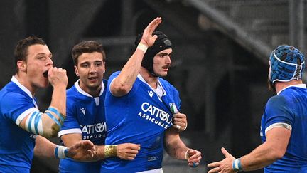 Le trois-quarts centre italien Carlo Canna (avec le casque) contre la France en novembre 2020 (ANNE-CHRISTINE POUJOULAT / AFP)