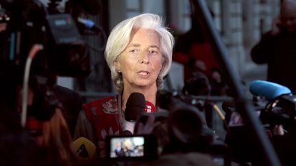 La directrice g&eacute;n&eacute;rale du FMI, Christine Lagarde, &agrave; la sortie de son audition devant la Cour de justice de la R&eacute;publique, qui l'a plac&eacute; sous le statut de t&eacute;moin assist&eacute;. (JACQUES DEMARTHON / AFP)