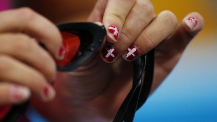 Les ongles de la Danoise Lotte Friis au d&eacute;but des JO de Londres, le 26 juillet 2012. (JORGE SILVA / REUTERS)