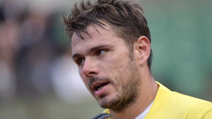 Le Suisse Stanislas Wawrinka, apr&egrave;s sa d&eacute;faite contre l'Espagnol Guillermo Garcia-Lopez, le 26 mai 2014 &agrave; Roland-Garros. (MIGUEL MEDINA / AFP)